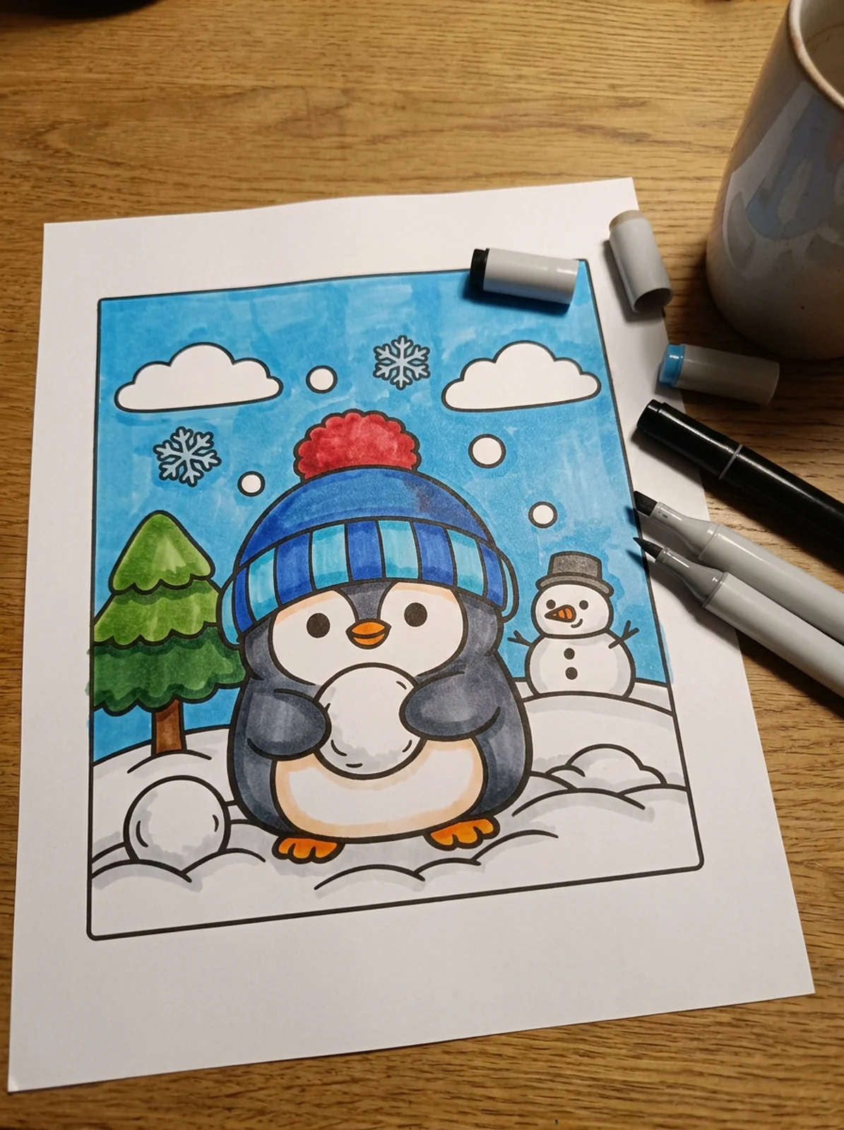 Baby Penguin in a Beanie coloring page printed and half colored with markers