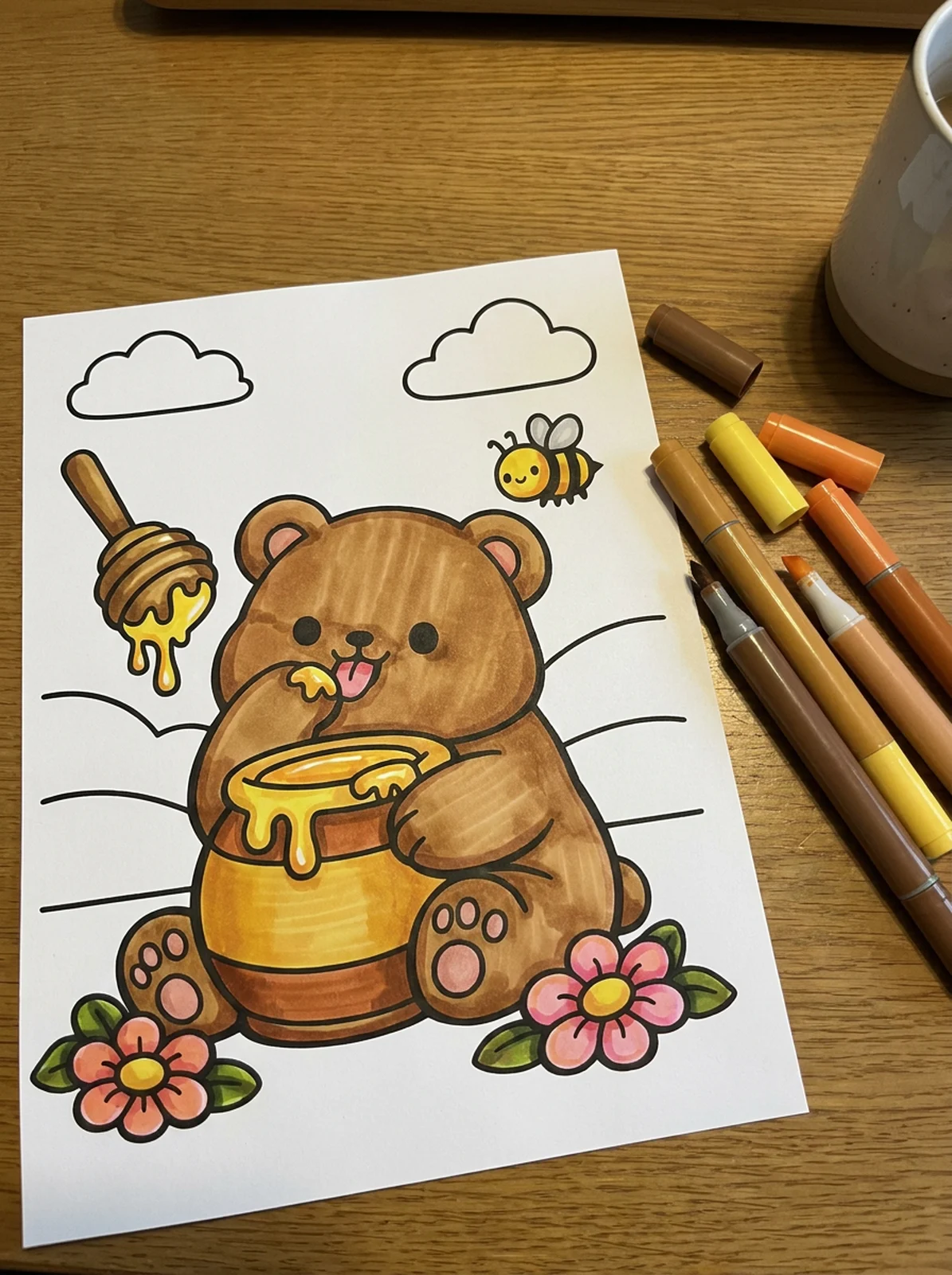 Bear Eating Honey from a Jar coloring page printed and half colored with markers