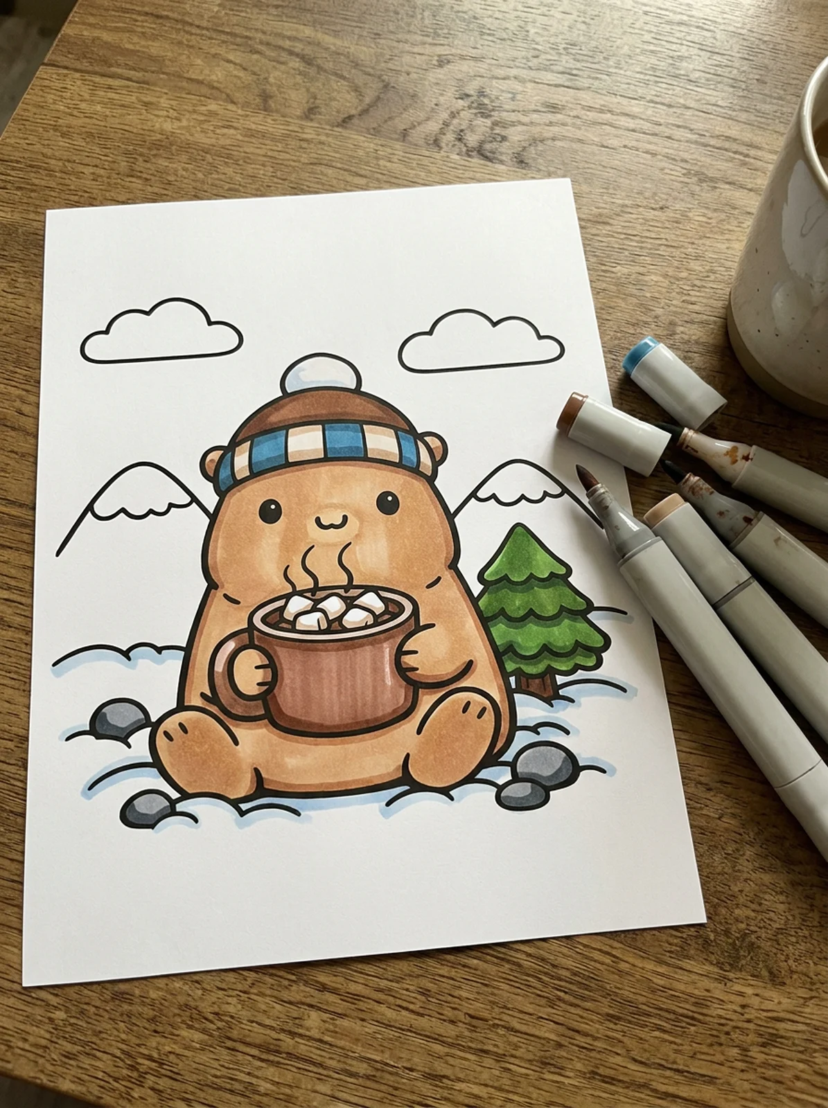 Capybara Holding a Mug of Hot Cocoa coloring page printed and half colored with markers