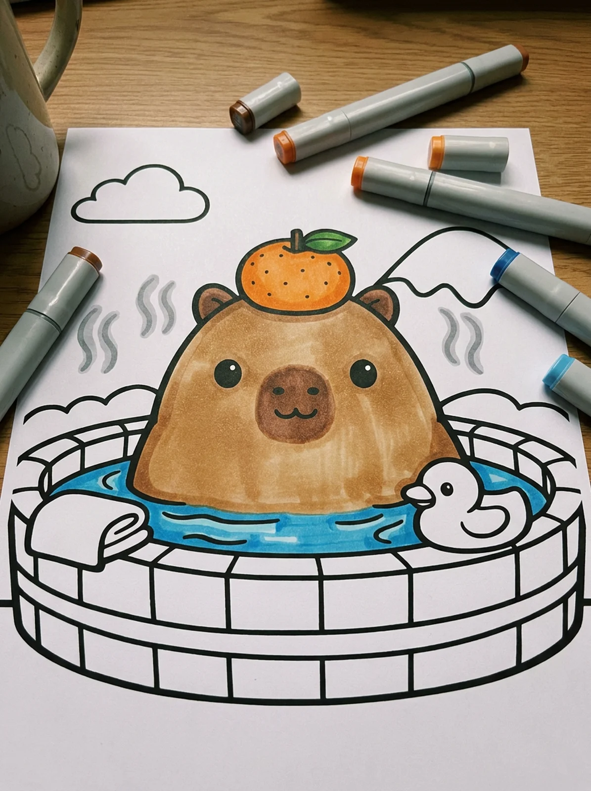 Capybara with a Yuzu on Its Head coloring page printed and half colored with markers