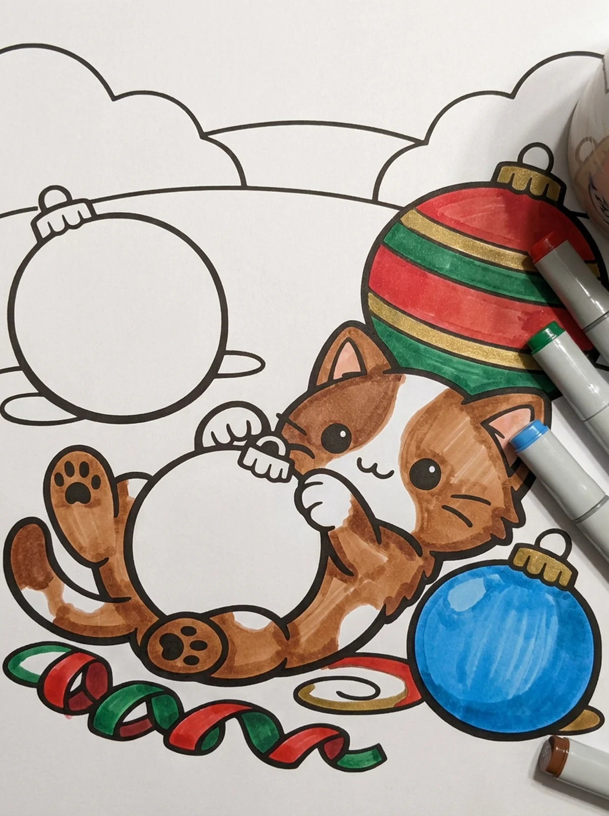 Kitten Playing with Christmas Ornaments coloring page printed and half colored with markers