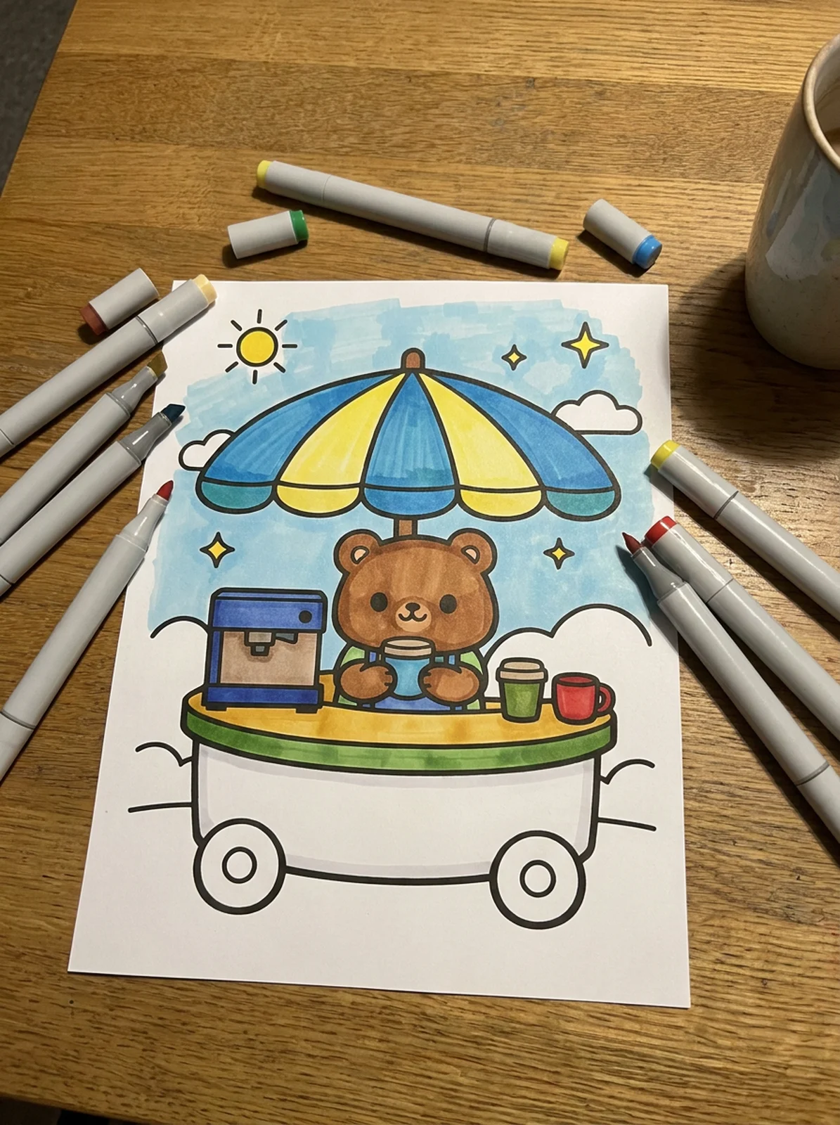 Little Coffee Cart with an Umbrella coloring page printed and half colored with markers