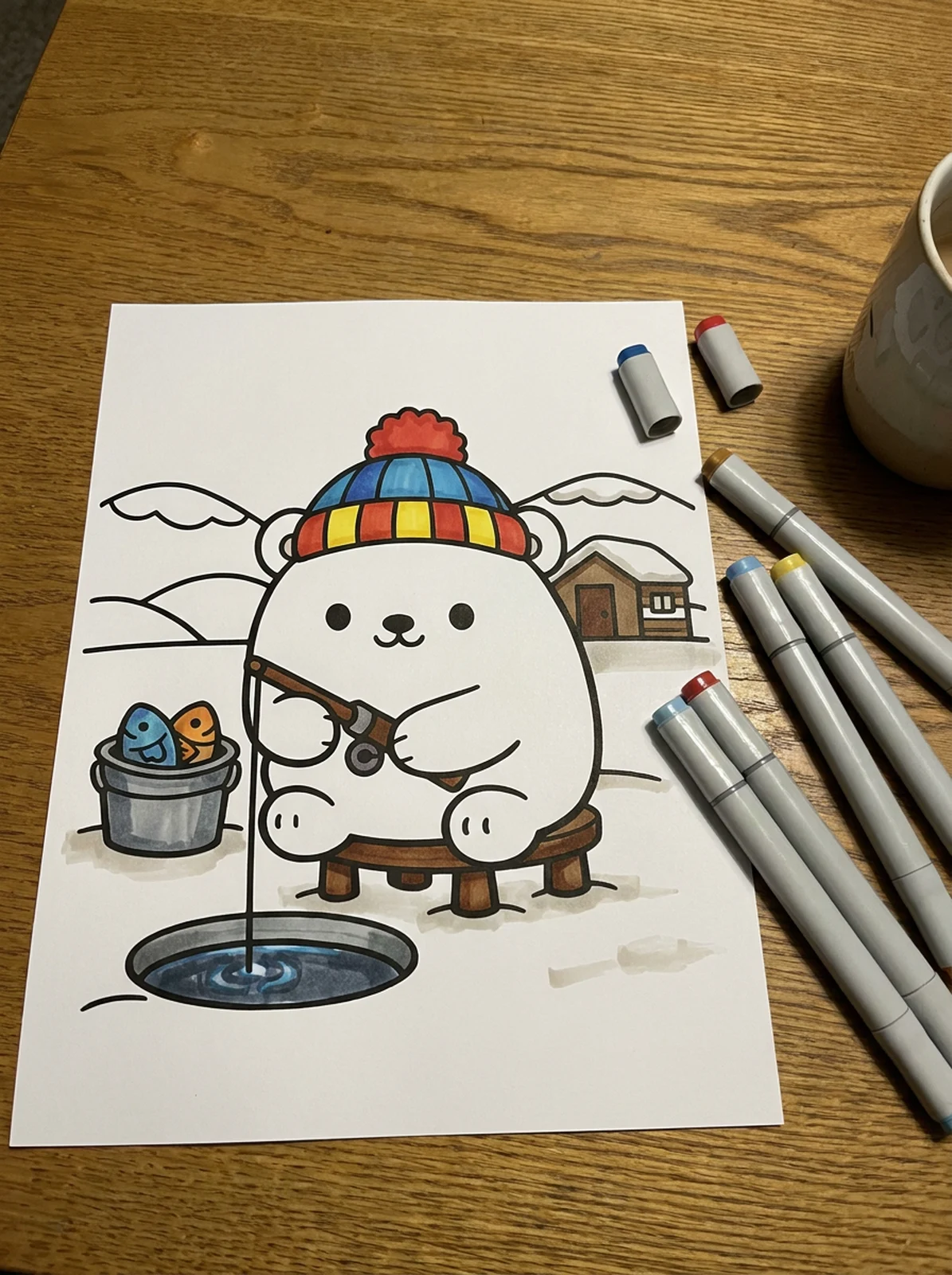 Polar Bear Fishing Through the Ice coloring page printed and half colored with markers