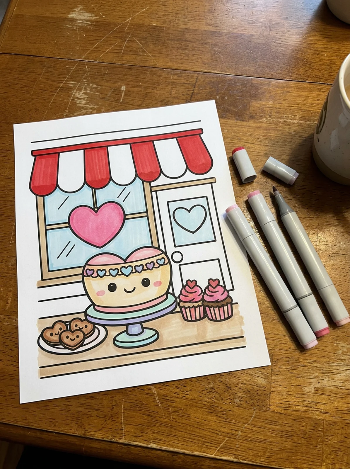 Valentine Bakery Window Display coloring page printed and half colored with markers